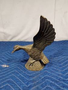 lot 13 image: Solid brass duck
