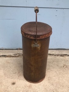 lot 218 image: Vintage Metal Can with Wood Handle