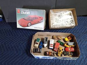 lot 26 image: Lamborghini Diablo model kit and a flat of die cast cars