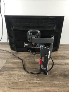 lot 342 image: Vizio 18 TV with Remote & TV Mount on Back