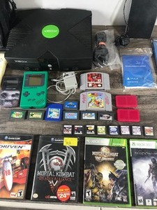 lot 357 image: Lot of Video Games, Gaming Equipment & More - List of items is listed in description