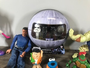 lot 411 image: Lot of Toys - PEZ Star Wars - Teenage Mutant Ninja Turtles - Legos - Accessories & Action Figure Parts & More