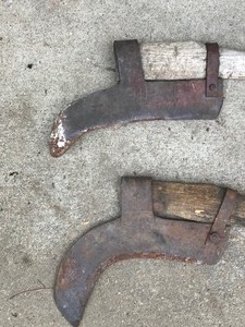 lot 499 image: 2 - Vintage Brush Cutter Axes