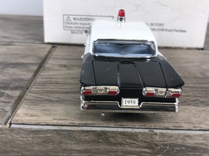 lot 554 image: The National Motor Museum Mint - 1958 Ford Fairlane Rye Police Car - 132 scale die cast