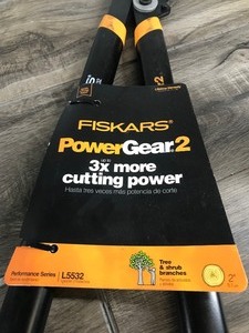 lot 557 image: Fiskars Power Gear 2 Cutters - 3X more cutting power - Cutting Branches