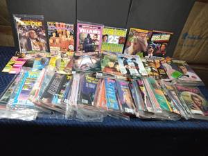 lot 196 image: Tote of Twilight Zone, Star trek, Villain, Star Log and more magazines