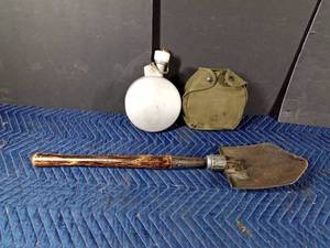 lot 178 image: Military canteen and shovel