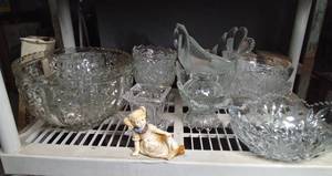 lot 168 image: Shelf full of crystal and glassware and figurine