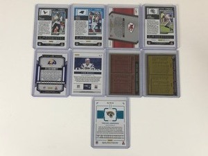 lot 571 image: Lot of 9 Collectible Football Cards - CJ Stroud - Patrick Mahomes - Roger Staubach - Terry Bradshaw & More