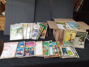 lot 146 image: 70s mother earth News magazines