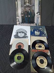lot 141 image: Beatles LP, Kiss & Paul Mcarthy & wings 45s, John Lennon pencil drawing print and more