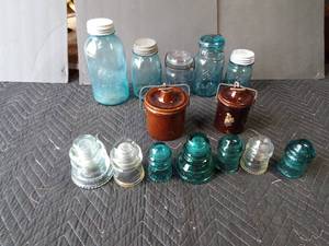 lot 133 image: Green glass Ball canning jars, 1 Seafest jar with glass and metal lids, 2 crocks with lids, and green and clear insulators