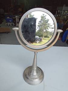 lot 85 image: Metal table top double sided make-up mirror
