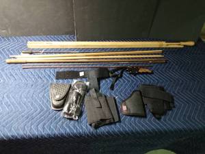 lot 43 image: vintage wood gun cleaning rods, ammopistol holster belt and more