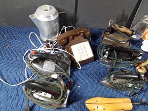 lot 176 image: Box vintage irons, telephone, syrup bottle and more
