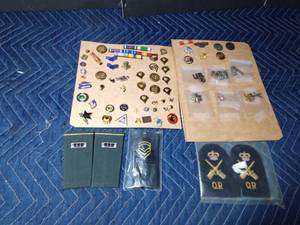 lot 33 image: Military pins, shoulder patches and more pins