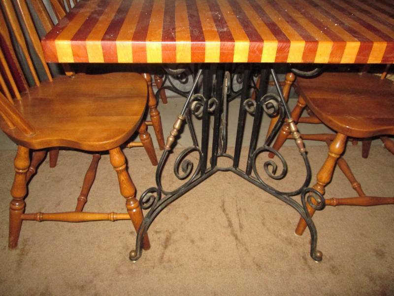 WOW Wrought iron framed dining table with wood Butcher block style top and (4) matching star back chairs (table approximately 48in30in29.5in