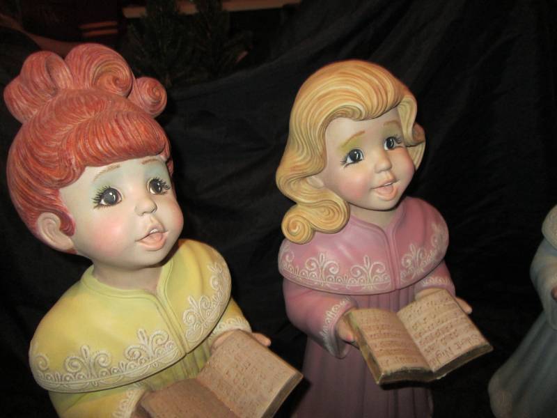 Trio of tenderly caroling Children (painted ceramic and approximately 18 tall)