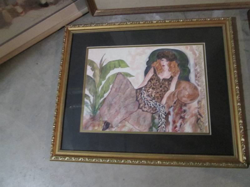 Collection of signed artwork and wall decor