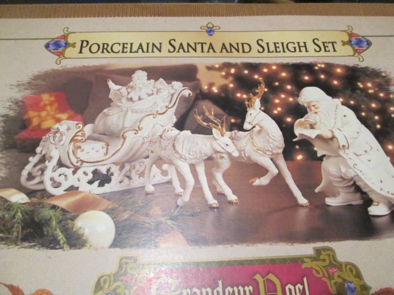 Porcelain Santa and Sleigh figurine Set (new in original box)