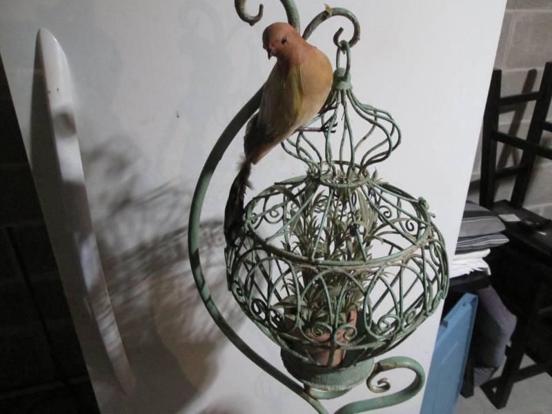 Rustic Style Metal shepherds hook style stand with hanging Bird Cage, faux foliage and even a Feathered friend