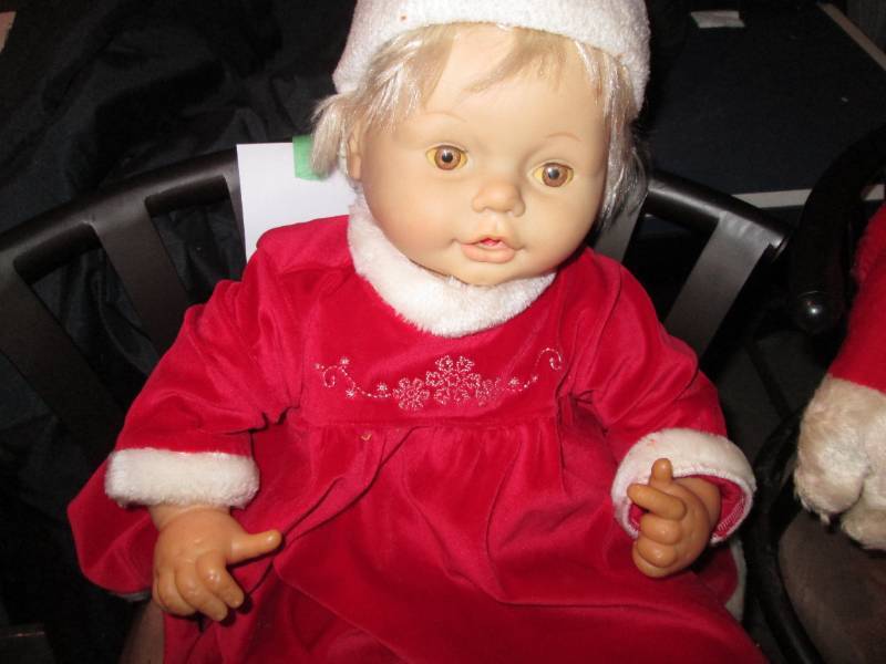 Near life-size Vintage Christmas dressed baby doll