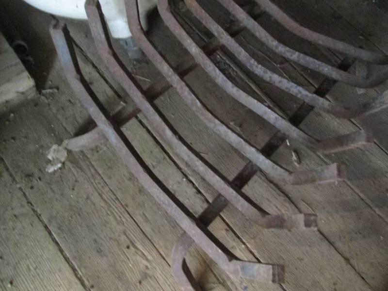 Wrought Iron log holder for a fireplace
