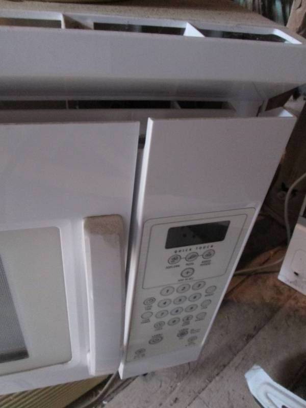 White Whirlpool Over-the-stove Microwave
