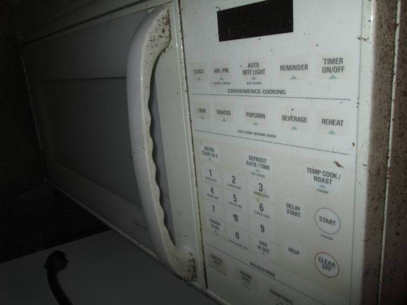 White GE Over-the-stove Microwave