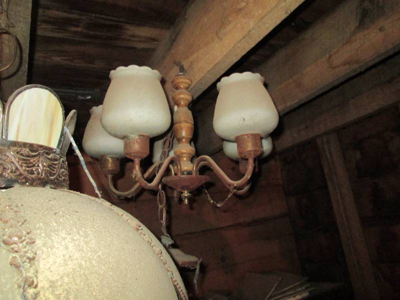 Pair of non-matching hanging chandelier style light fixtures