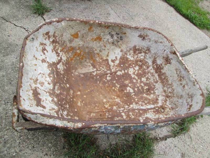 Previously Worked Metal bucket wheelbarrow