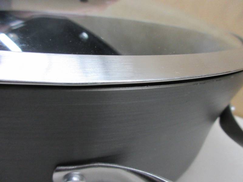 lot 659 image: Calphalon Contemporary Hard-Anodized Aluminum Nonstick Cookware, Dutch Oven, 8 12-quart, Black NEW BUT SLIGHTLY DAMAGED   LID CLOSES BUT NOT 100%, HAS A COUPLE SCUFFS AND SCRATCHES   STILL GOOD FOR USE
