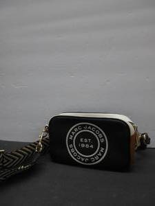 lot 217 image: Marc Jacobs Flash Leather Crossbody Bag, BlackBrown Multi USED, HAS MAKEUP STAINS INSIDE