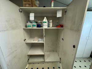 lot 18 image: White Storage Cabinet (Cabinet Only. Content Not Included)