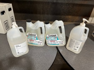 lot 59 image: Two 1-Gallon Hand Sanitizer Pump Dispensers and Two 1-Gallon Hand Sanitizer Refills