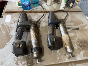 lot 66 image: Two Battery Operated Grease Guns