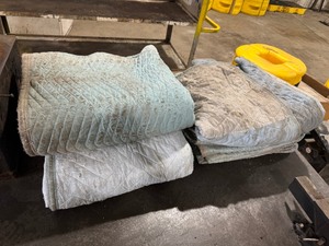 lot 74 image: Four Packing Blankets