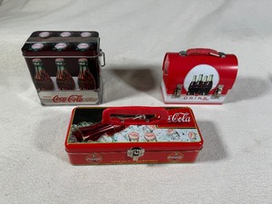 lot 142 image: Coca Cola Collectible Tins (Qty 3)