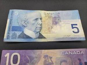 lot 102 image: 3 Assorted Canadian Foreign Currency Bills