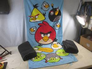 lot 50 image: (CS) Angry Bird Beach Towel and 2 Black Beach Towels