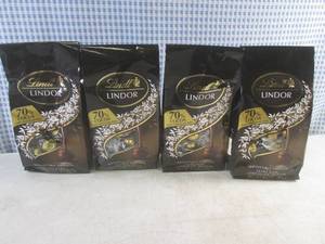 lot 113 image: (B-1) 4 Bags Lindt Lindor Extra Dark Chocolate Truffles 8.5oz Bags Best by April 2025