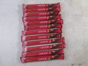 lot 233 image: (B-1) 12 Lindt Lindor Milk Chocolate Truffle Bars Best by April 2024