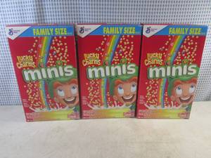 lot 253 image: (C-1) 3 Family Size Boxes Lucky Charms Minis Cereal Best by March 2024