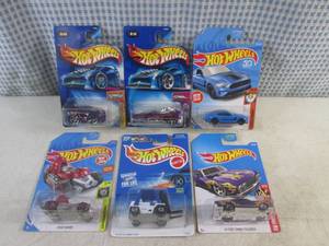 lot 276 image: (EC1) Assorted Hot Wheels in Packaging