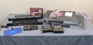 lot 35 image: Connectivity Lot Wireless Antennas, Transmitters, Dell PowerConnect, HP ProCurve Switch, Vantec 4-Port Host Card and More