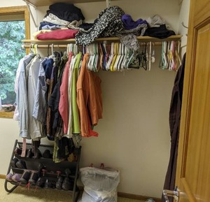 lot 24 image: Large Assortment of Womens Clothes in Various Sizes, Children to Adult Costumes, Shoes, Hangers, Etc.