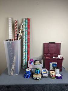 lot 3 image: (2) Plastic Bins Full of Ribbons and (9) Wrapping Paper Rolls