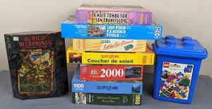 lot 4 image: Lego in Plastic Bin and (8) Jigsaw Puzzles