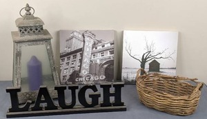 lot 5 image: Home Decor (2) Prints, Laugh Sign, Tin Lantern with Candle