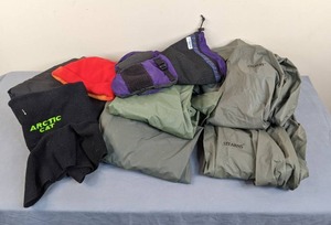 lot 75 image: Lot of Ponchos, Stearns Rain Pants and Rain Jacket, Hats, Wintergreen Mittens, and Snow Pants